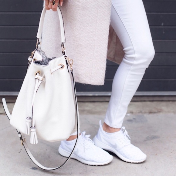 Nike Shoes - NWOB Nike Juvenate white sneakers